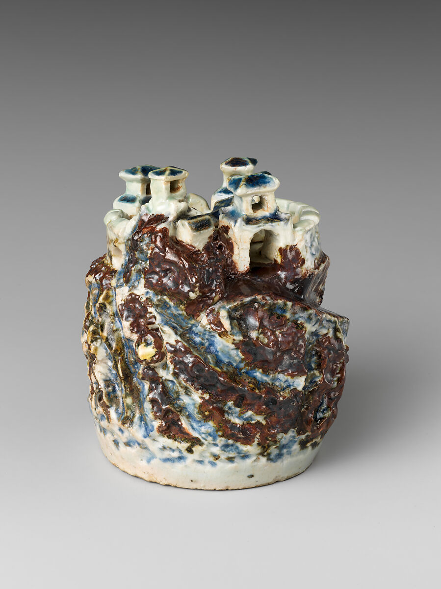 Water dropper in the shape of a mountain citadel, Porcelain painted in underglaze cobalt and copper red, Korea