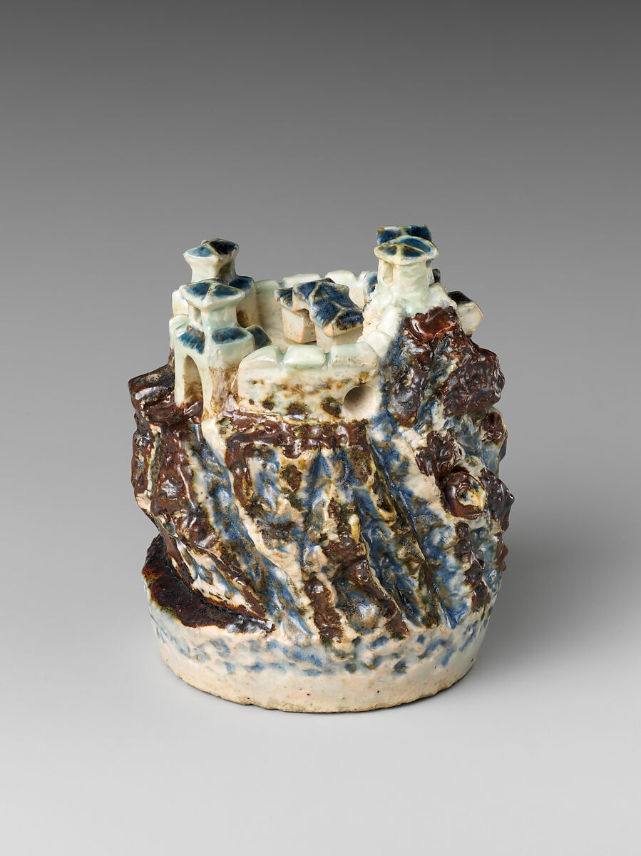 Water dropper in the shape of a mountain citadel, Porcelain painted in underglaze cobalt and copper red, Korea