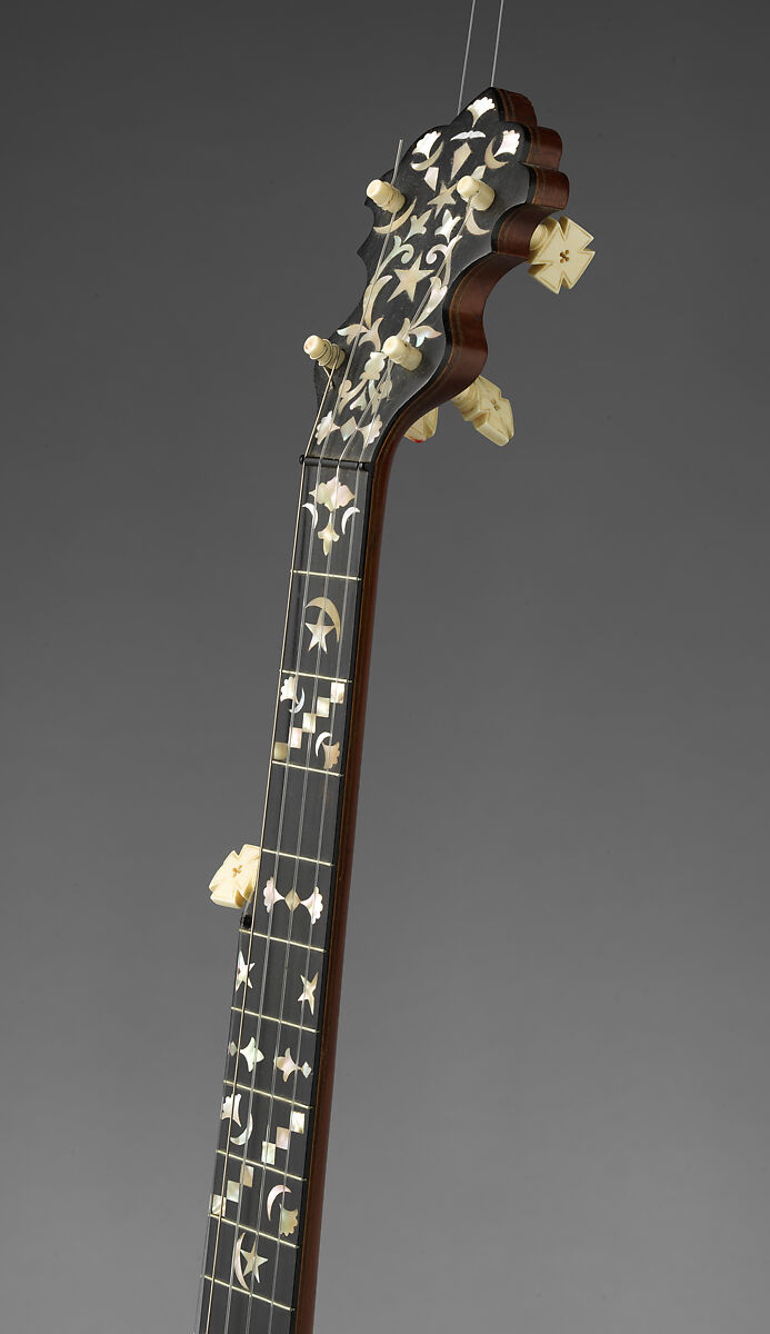 “Lady Stewart #3” 5-string banjo, Samuel Swain Stewart, Calfskin head, various woods (including ebony), metal hardware and cladding over rim, mother of pearl and abalone inlays, ebony fingerboard, nylon strings, ivory tuning pegs, ivory tail piece ornament and ebony nut, American