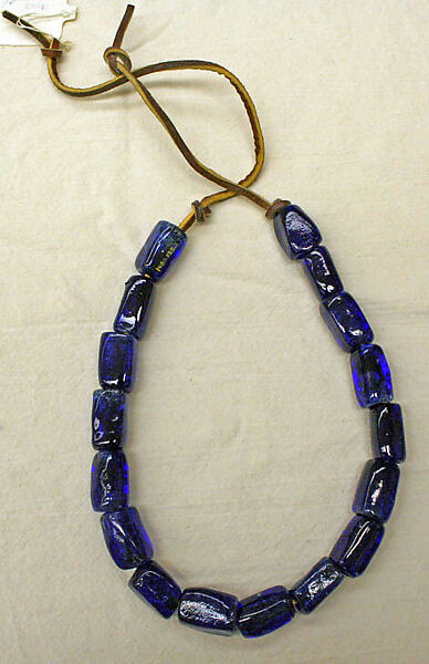 Necklace, leather, glass, probably American 