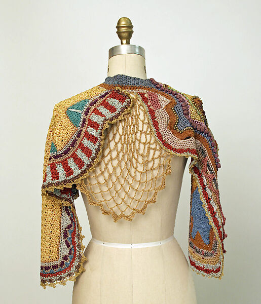 Cape, rayon, plastic, American