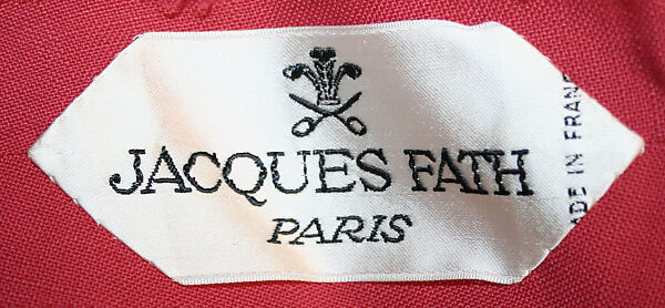 Ensemble, (a–c) House of Jacques Fath (French, founded 1937), (a, b) linen, silk, nylon
(c) linen, leather
(d) straw, French