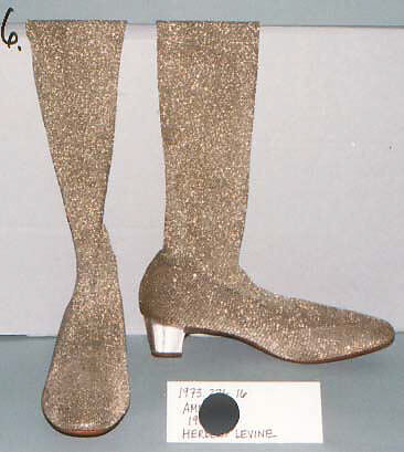 Boots, plastic (vinyl), synthetic fiber, American