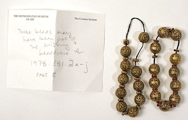 Flower girl ensemble, Yves Saint Laurent (French, founded 1961), (a) silk, metallic thread, cotton, nylon, metal, glass
(b) cotton, horsehair
(c, d) silk, metallic thread
(e) silk, metallic thread, metal
(f) metal, glass
(g, h) glass, metal
(i, j) metal, glass, French